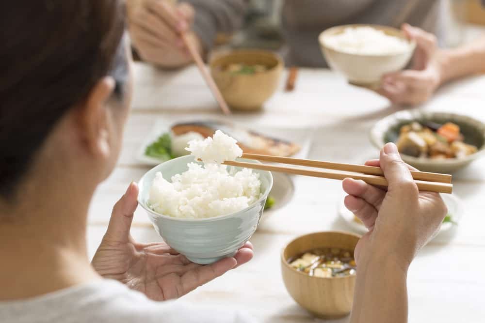 Japanese women eat rice